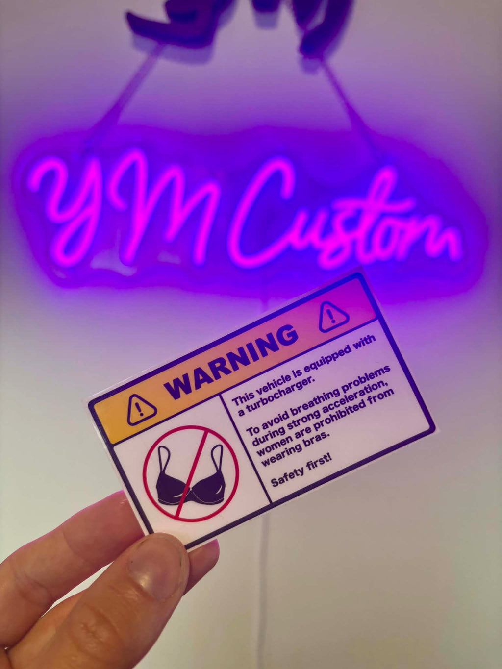 Humorous car sticker "Warning: No Bra Onboard" – decoration for cars or motorcycles, gift idea