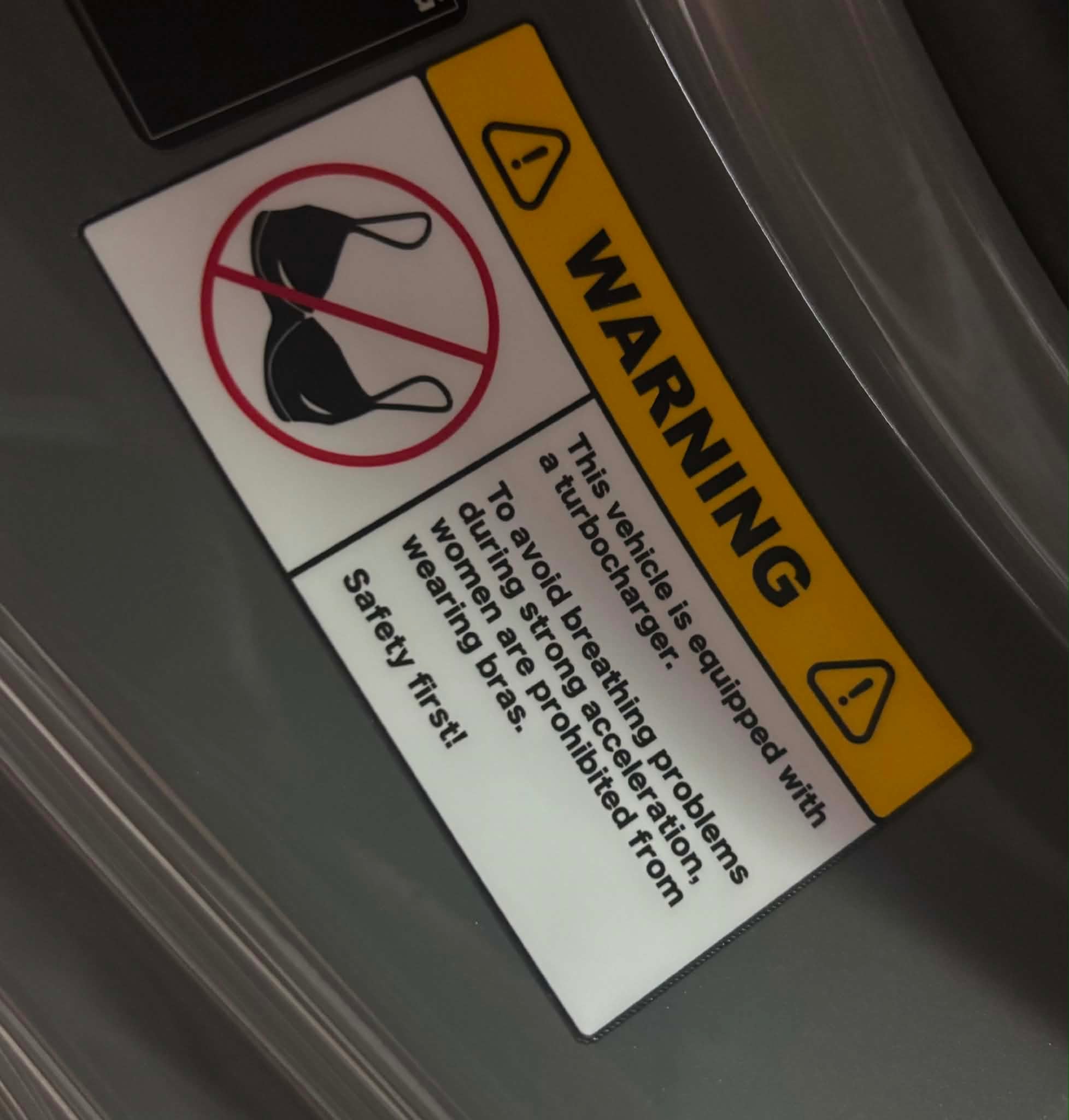 Humorous car sticker "Warning: No Bra Onboard" – decoration for cars or motorcycles, gift idea